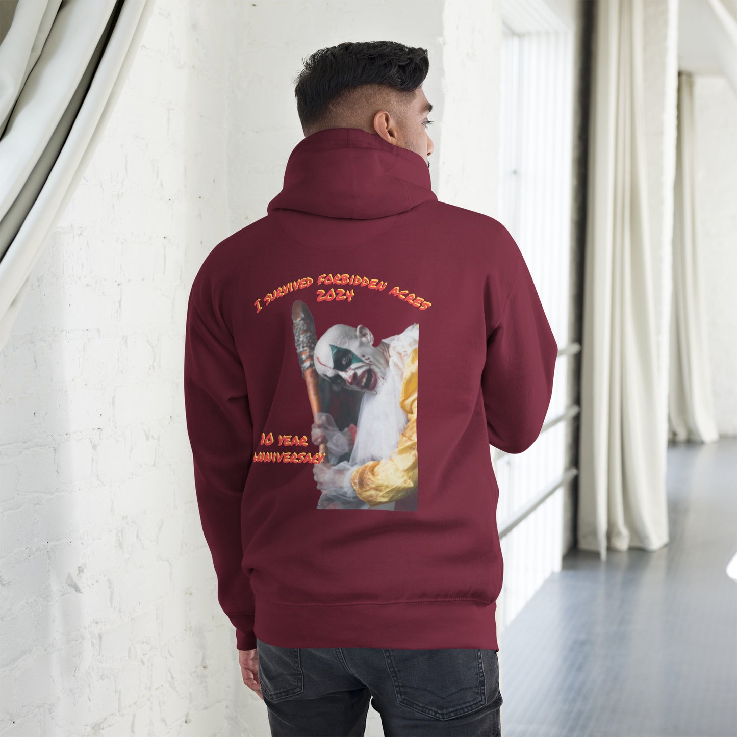 Unisex Hoodie with Forbidden Acres Logo on front chest and "i survived Forbidden Acres" clown on back